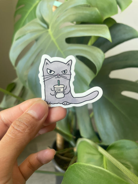 Grumpy Cat drinking coffee