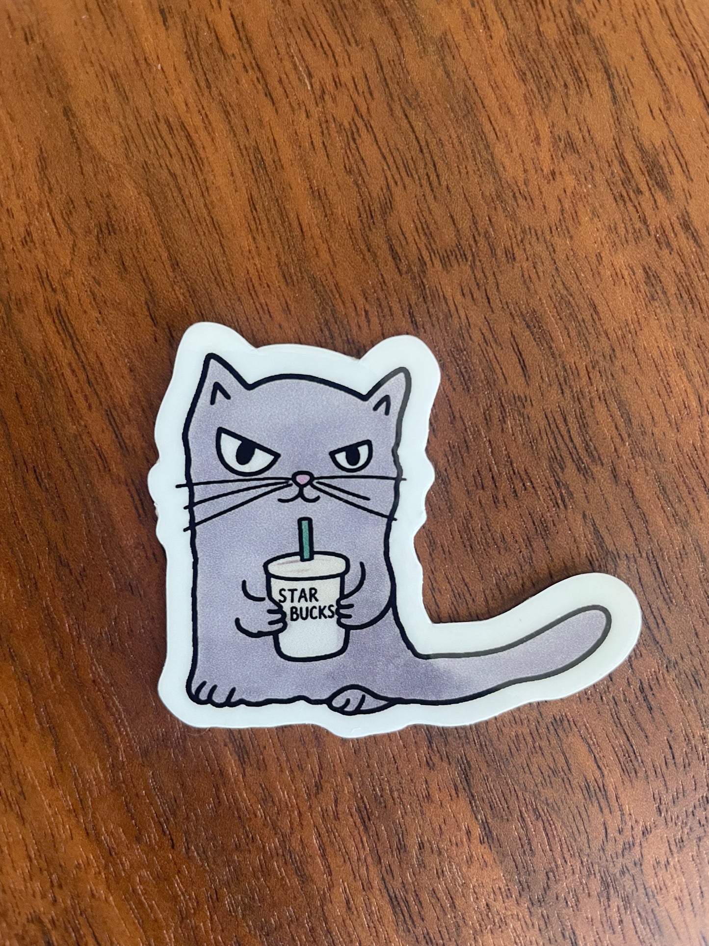 Grumpy Cat drinking coffee